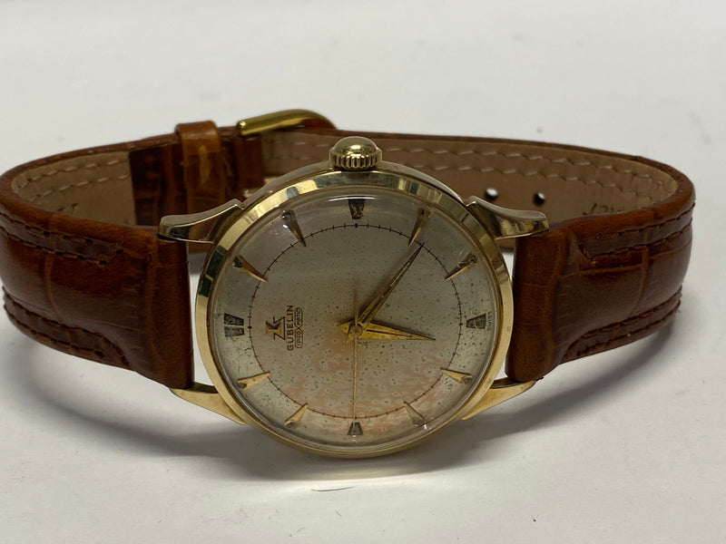 1950s Audemars Piguet square case signed Gübelin in 18kt yellow gold -  Sabiwatches