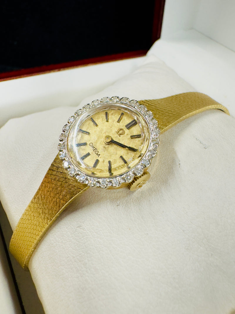 Ladie's Omega Wristwatch of 27 Round Diamonds, Solid Gold  -  $25K APR w/ COA!!! APR57