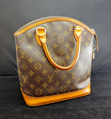 Louis Vuitton 2007 Gold Reflective Monogram Lockit Handbag · INTO